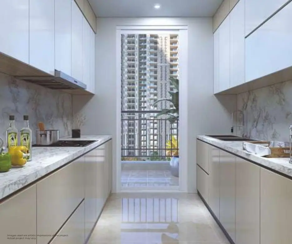 Modular kitchen with dry balcony at Prateek Grand Begonia